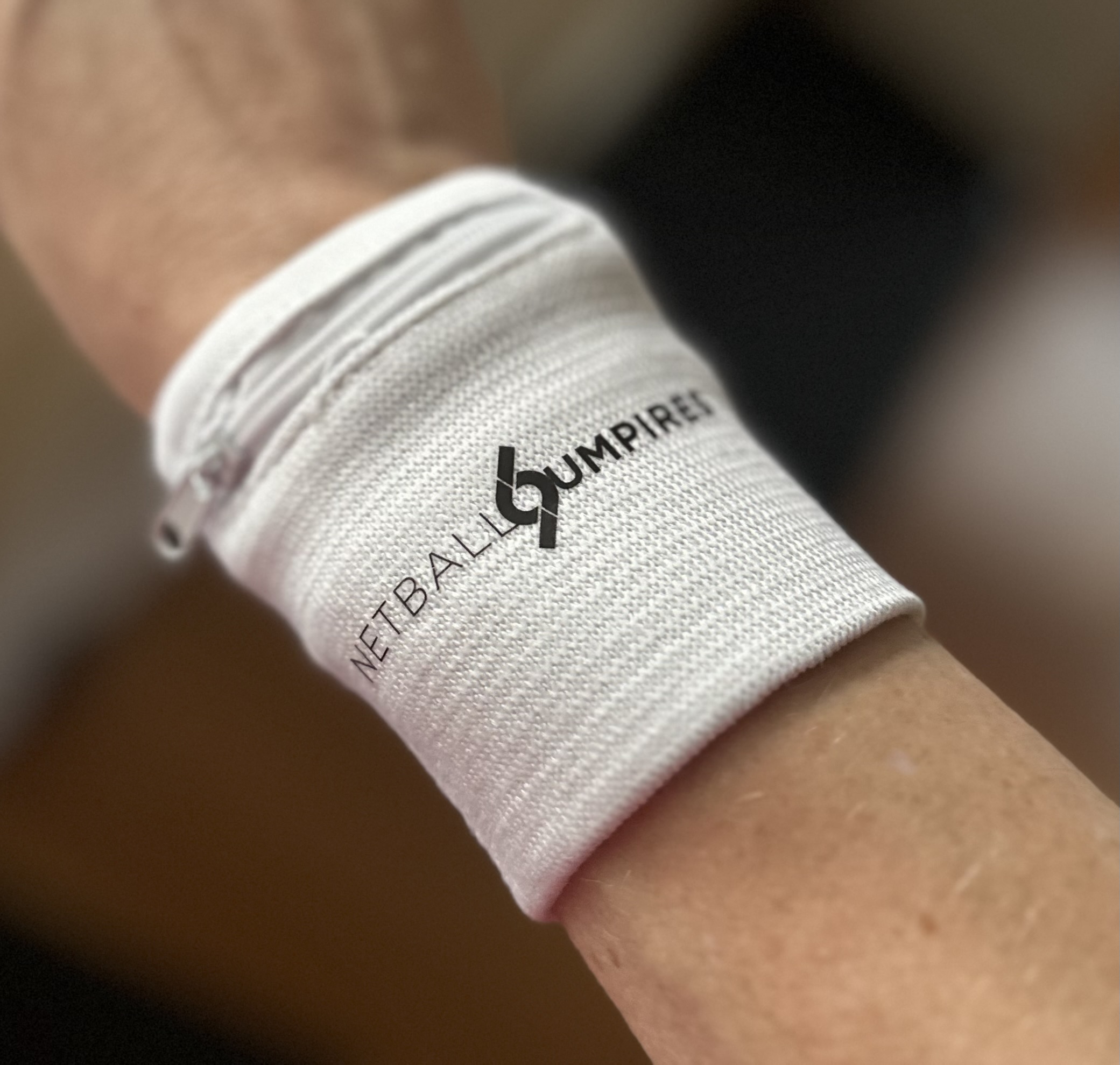 Netball umpires white wrist band with zip